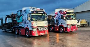 Two arctic lorries parked side by side