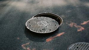 An image of an open drain cover