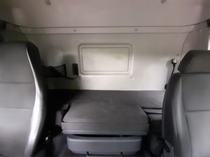 image of behind the two front seats of a truck for sale