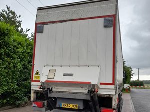 fabric backed truck with back doors closed for sale